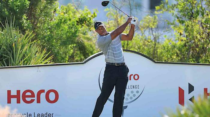 Tiger Woods hits a driver on the course during practice as a preview for the Hero World Challenge at Albany Golf Course on Nov. 28, 2023 in Nassau, Bahamas.